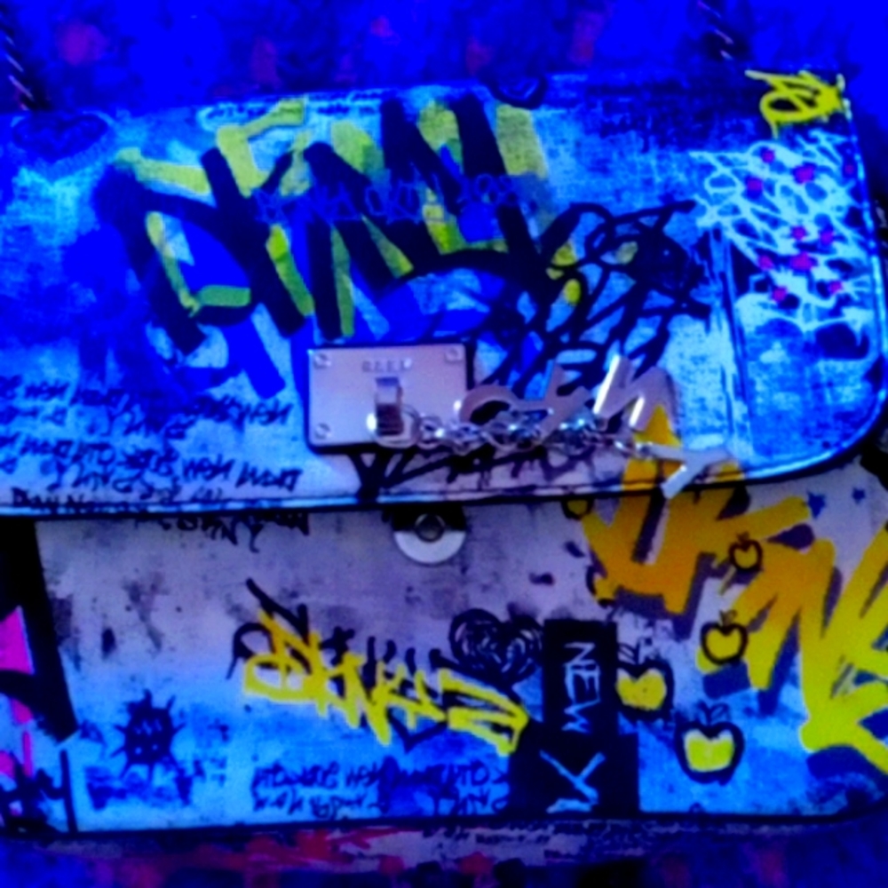 Dkny chain and leather strap,graffiti design.